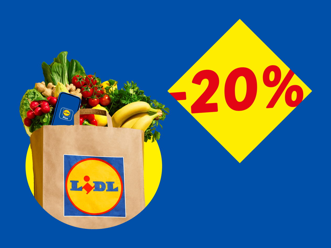 Einkaufstasche voller frischem Obst und Gemüse mit einem Smartphone und einem 20% Rabattzeichen.